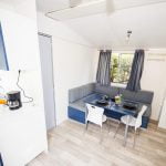 toscana-holiday-village-comfort-accom-4 Dining area in Comfort mobile home