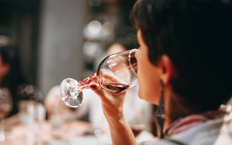 Woman drinking from a wine glass